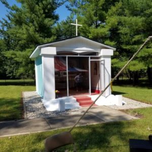 Restored, small, light-blue colored Italian POW-made chapel