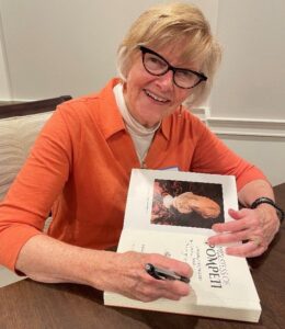 Author Sandra Hurt autographing her book